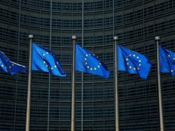 EU flags flutter outside the EU Commission headquarters in Brussels