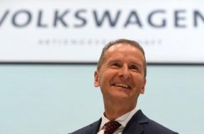 New VW CEO Diess smiles after news conference at the Volkswagen plant in Wolfsburg