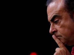 FILE PHOTO – Carlos Ghosn, Chairman and CEO of the Renault-Nissan Alliance, reacts during a news conference in Paris