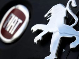 Logos of Peugeot and Fiat are seen in this illustration picture