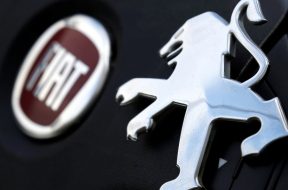 Logos of Peugeot and Fiat are seen in this illustration picture