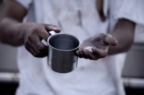 poor-man-begs-alms-homeless-asian-man-is-begging-money_1150-14708