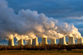 The setting sun illuminates cooling towers of a brown coal power station of the power company Vattenfall in Jaenschwalde, Germany, 15 December 2011. The power station is the biggest of its kind with an output of 3.000 megawatt, according to Vattenfall. 90
