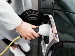 woman s hand plugging in a charging lead to her electric car Stockholm, Stockholm County, Sweden PUBLICATIONxINxGERxSUIx