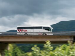 Spain, Elgoibar, Bus on elevated road in landscape