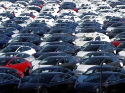 FILE PHOTO: A parking lot of predominantly new Tesla Model 3 electric vehicles is seen in Richmond, California