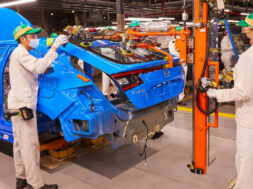 Indiana Auto Plant associates use a lift assist device to install the hatchback to the all-new 2022 Honda Civic Hatchback.