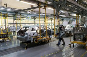 Employees work at the assembly line of the LADA Izhevsk automobile plant in Izhevsk